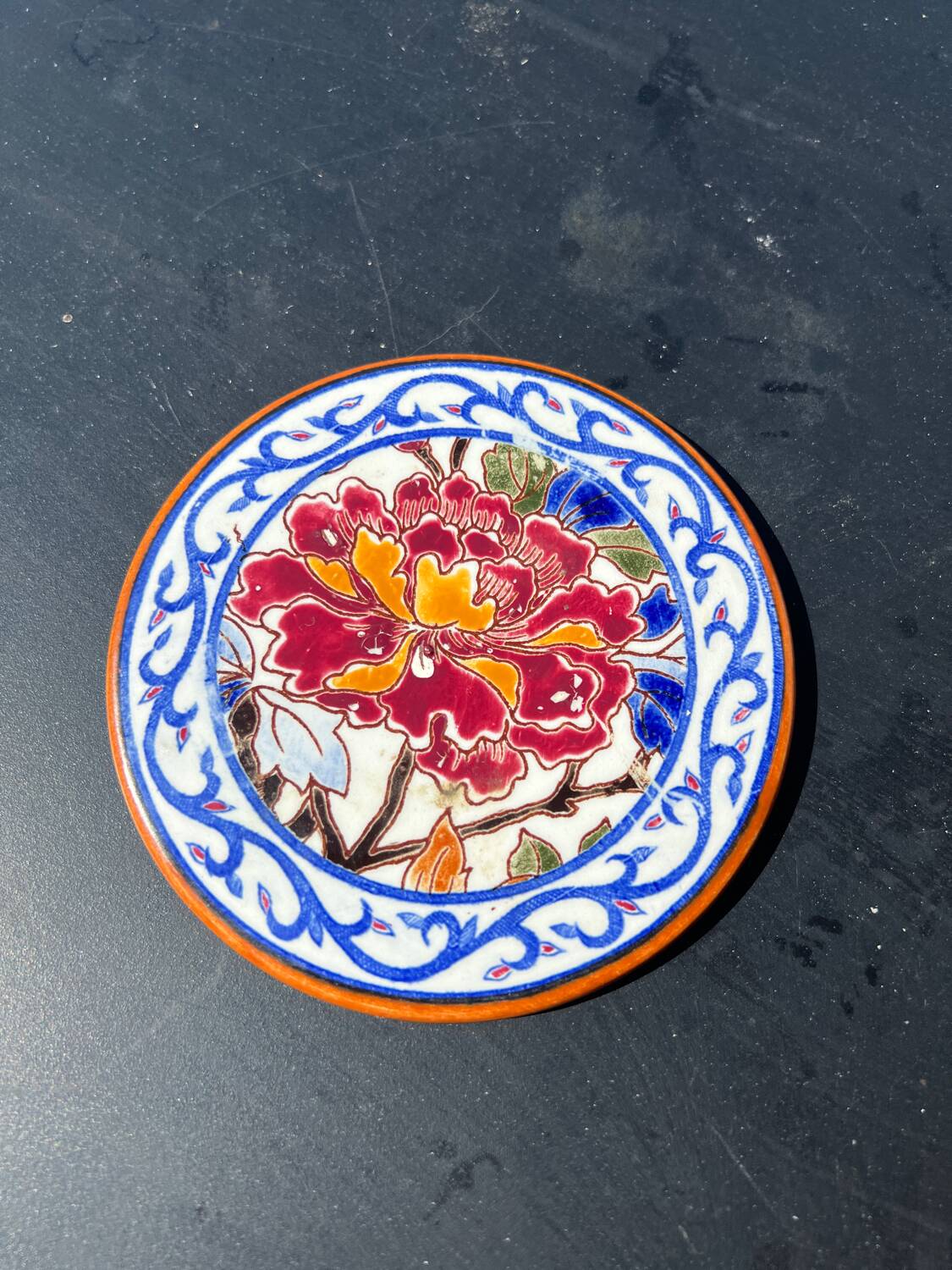 Hand-painted Gien bottle coaster