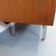 Vintage modernist enfilade in rosewood and chrome metal from the 60s and 70s.