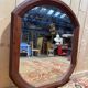 Miroir octogonal biseauté – Époque 1900 – Cadre bois teinté acajou