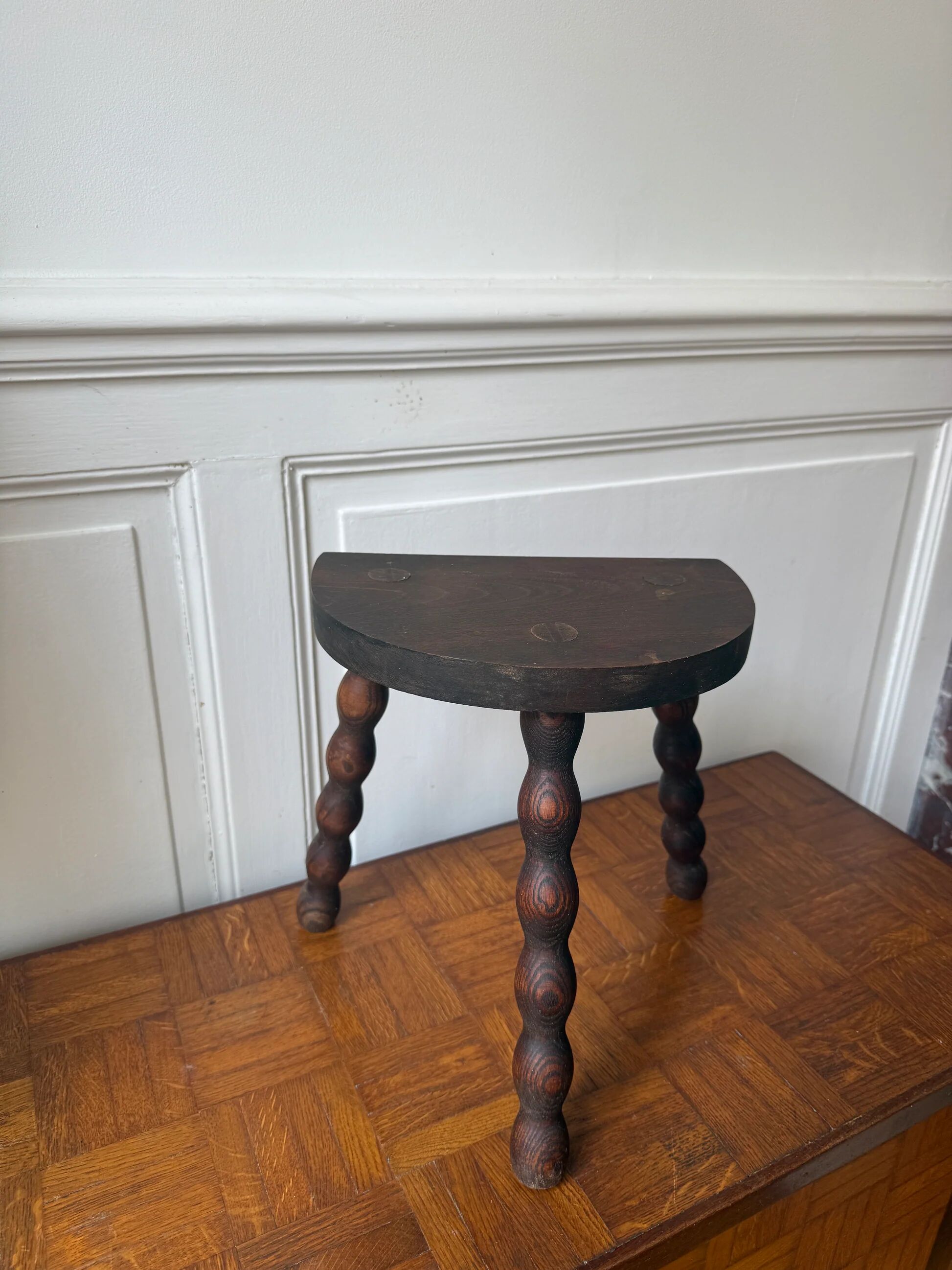 Three-legged turned wooden stool