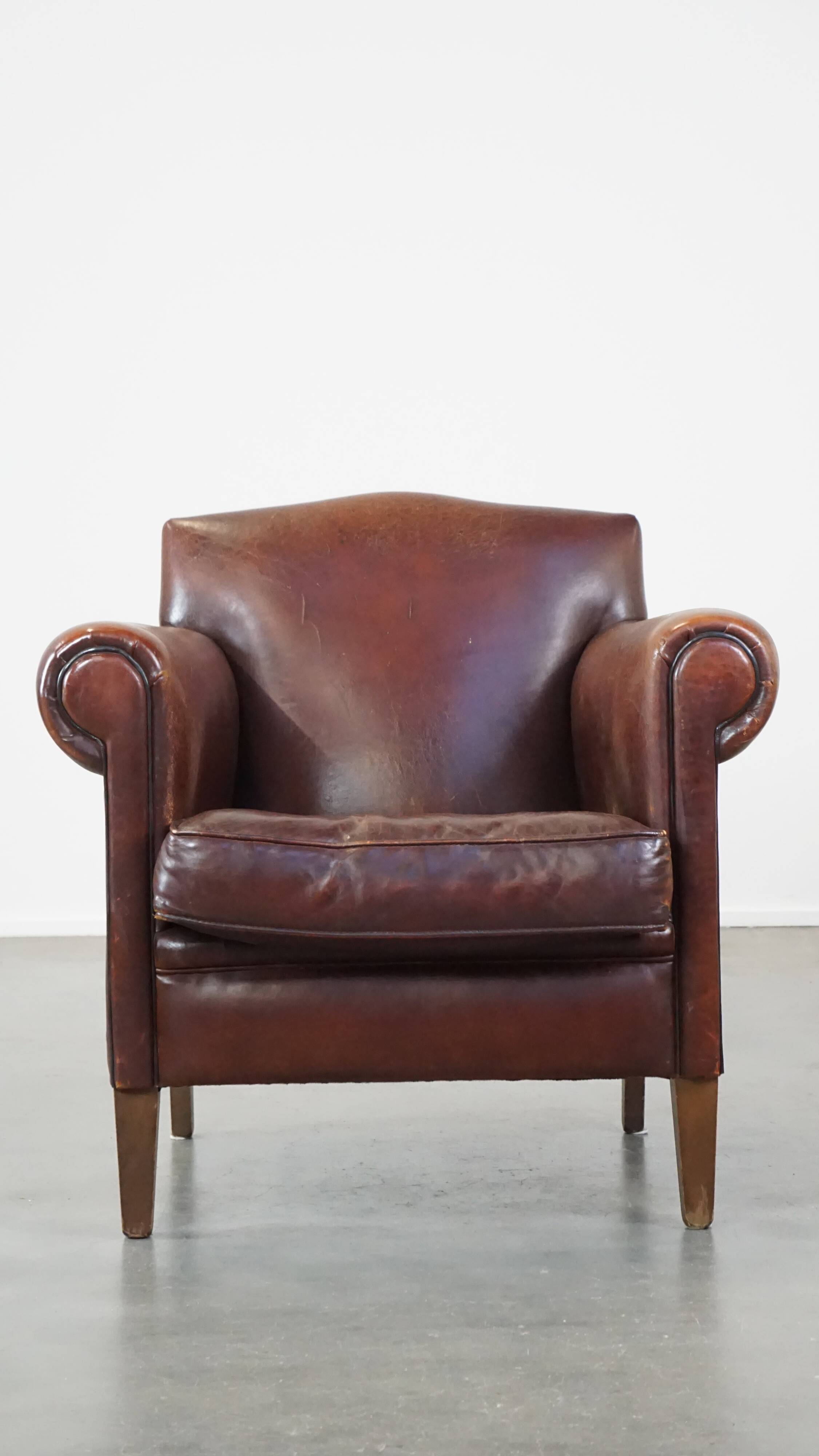 Design armchair made of sheep leather with a clean finish