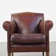 Design armchair made of sheep leather with a clean finish