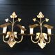 Pair of gold metal wall lights