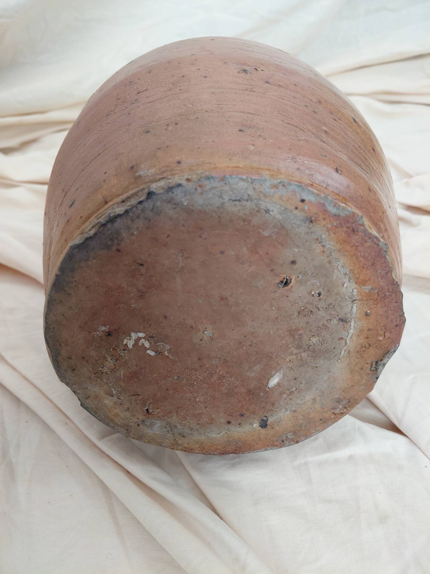 Old farm jug in glazed stoneware