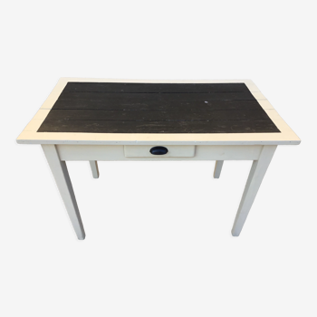 Table/desk with beige patinated square legs and black top