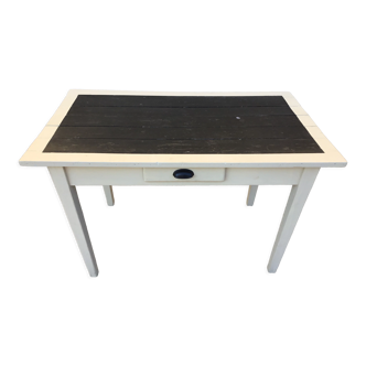 Table/desk with beige patinated square legs and black top