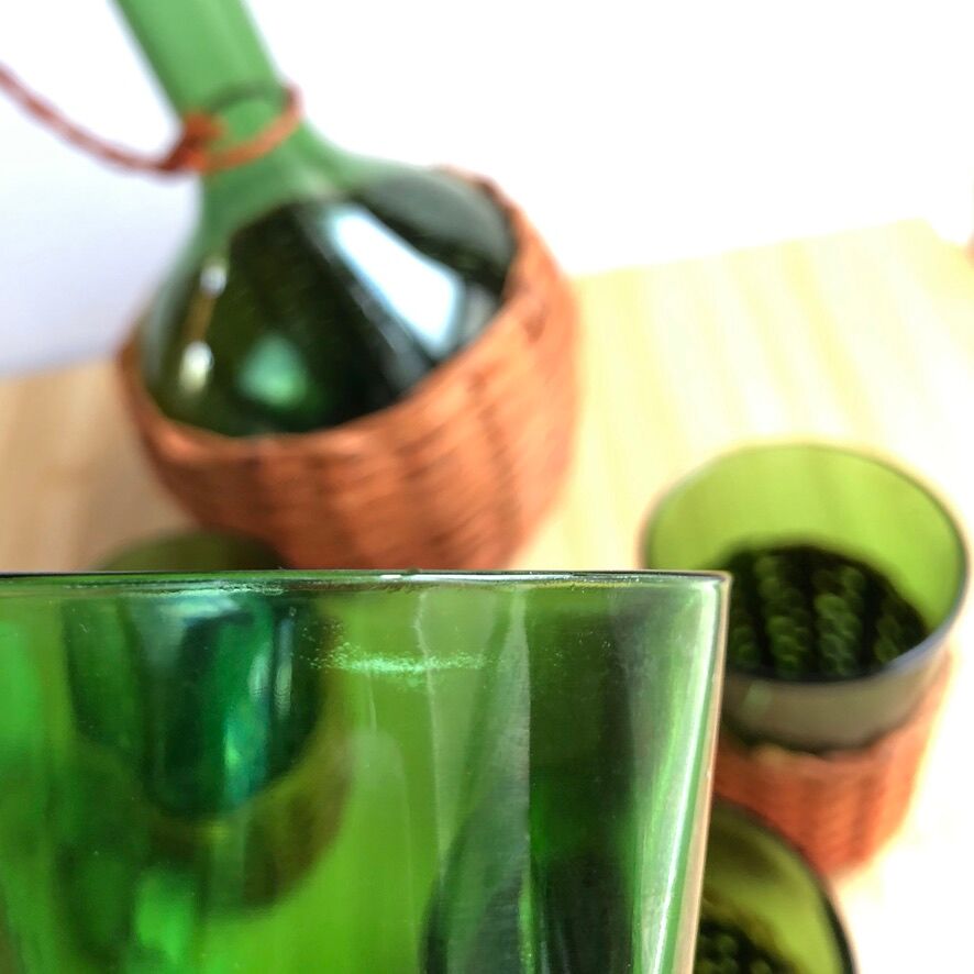 Service carafe and vintage glasses, with wicker