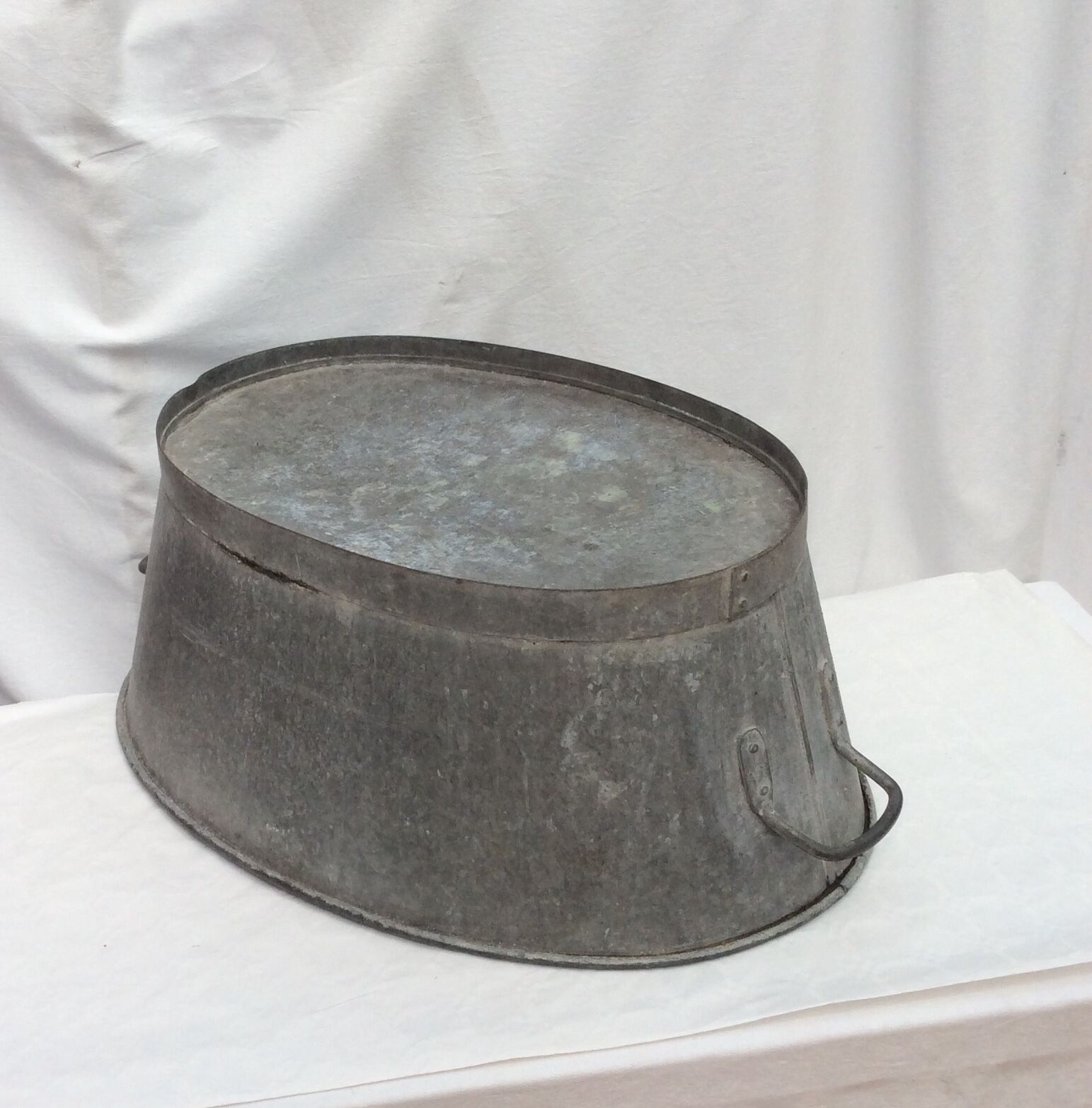 Old zinc basin oval shape with two handles