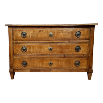 Louis XVI period chest of drawers in marquetry on mahogany background around 1780
