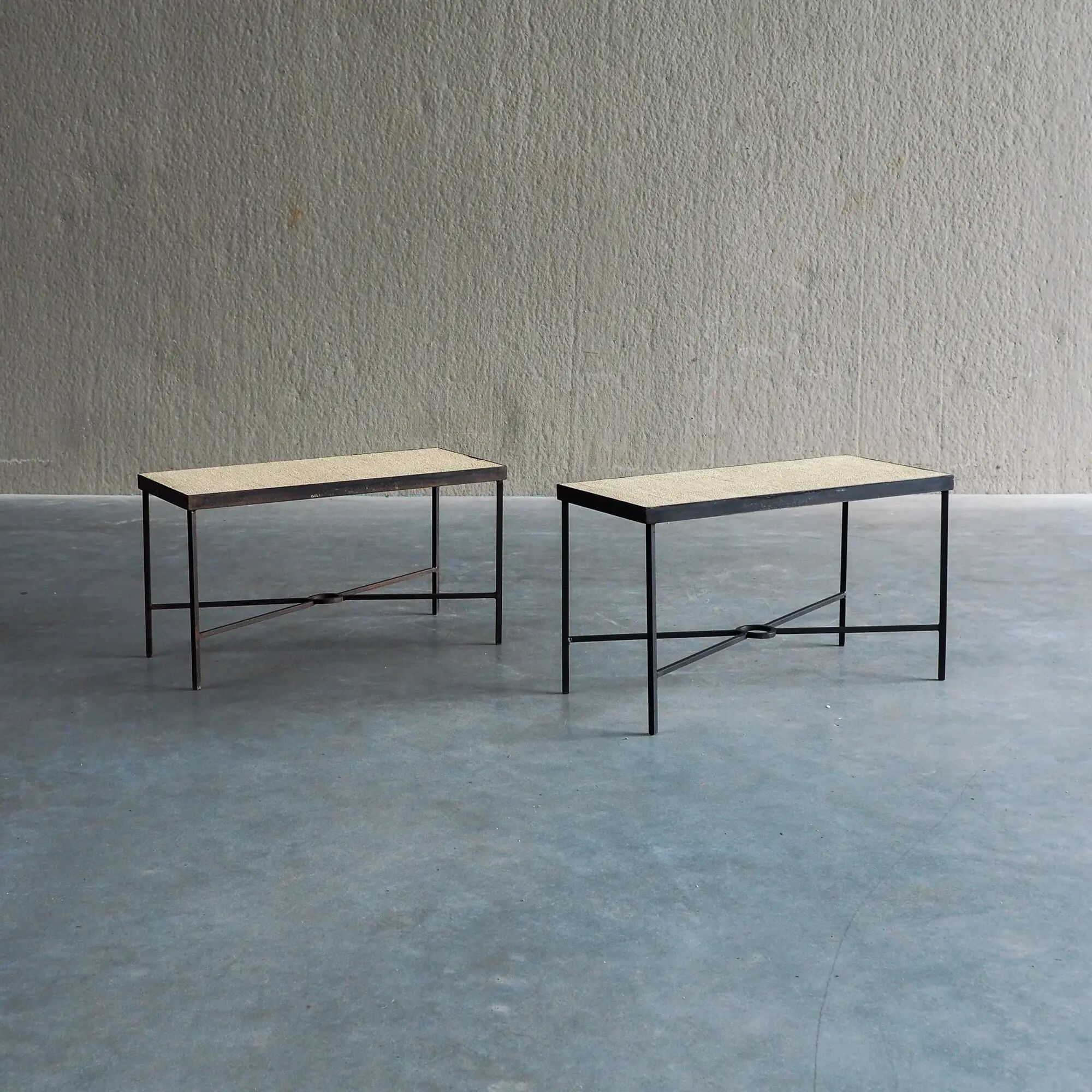 Set of 2 minimalist metal side tables with plaster-fiber tops
