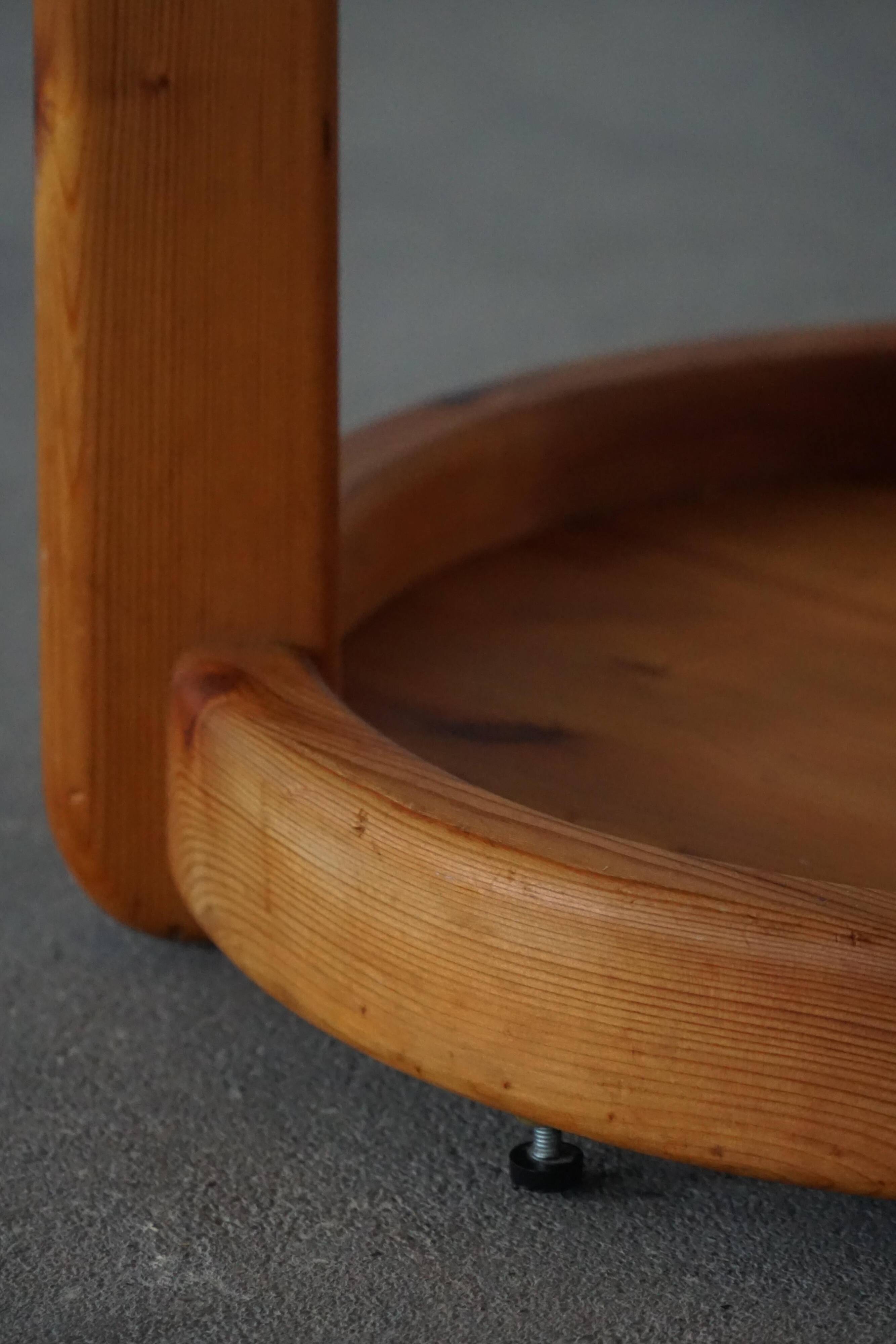 Modern Danish, brutalist round coat rack in solid pine, cylindrical shape, 1970s.
