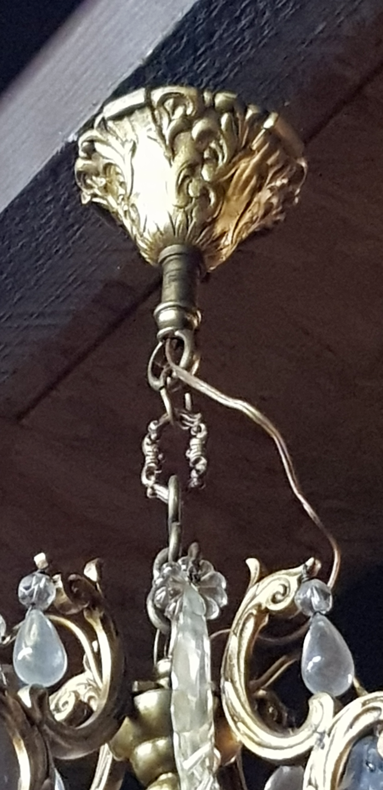 Bronze chandelier with stamps
