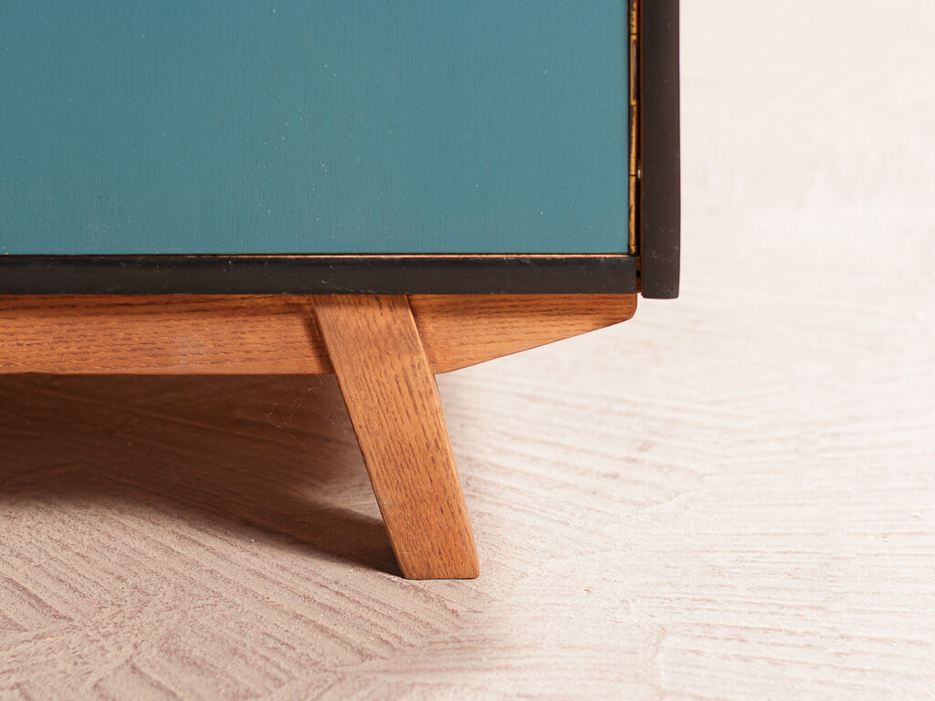 Vintage low sideboard restyled in blue with 2 swing doors and wooden base