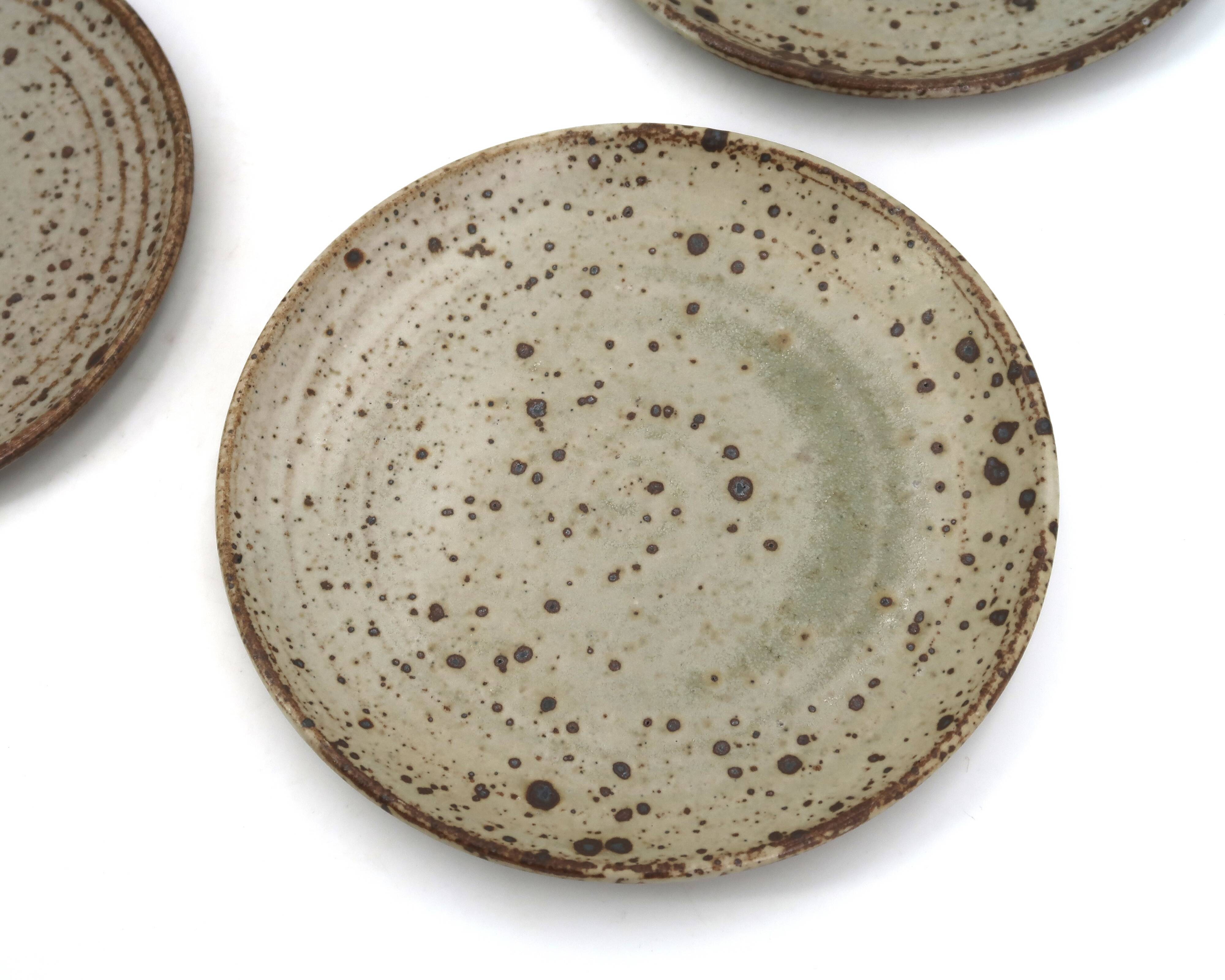 Dessert plates in pyrite stoneware by Gustave Tiffoche, ceramic from the 1970s.