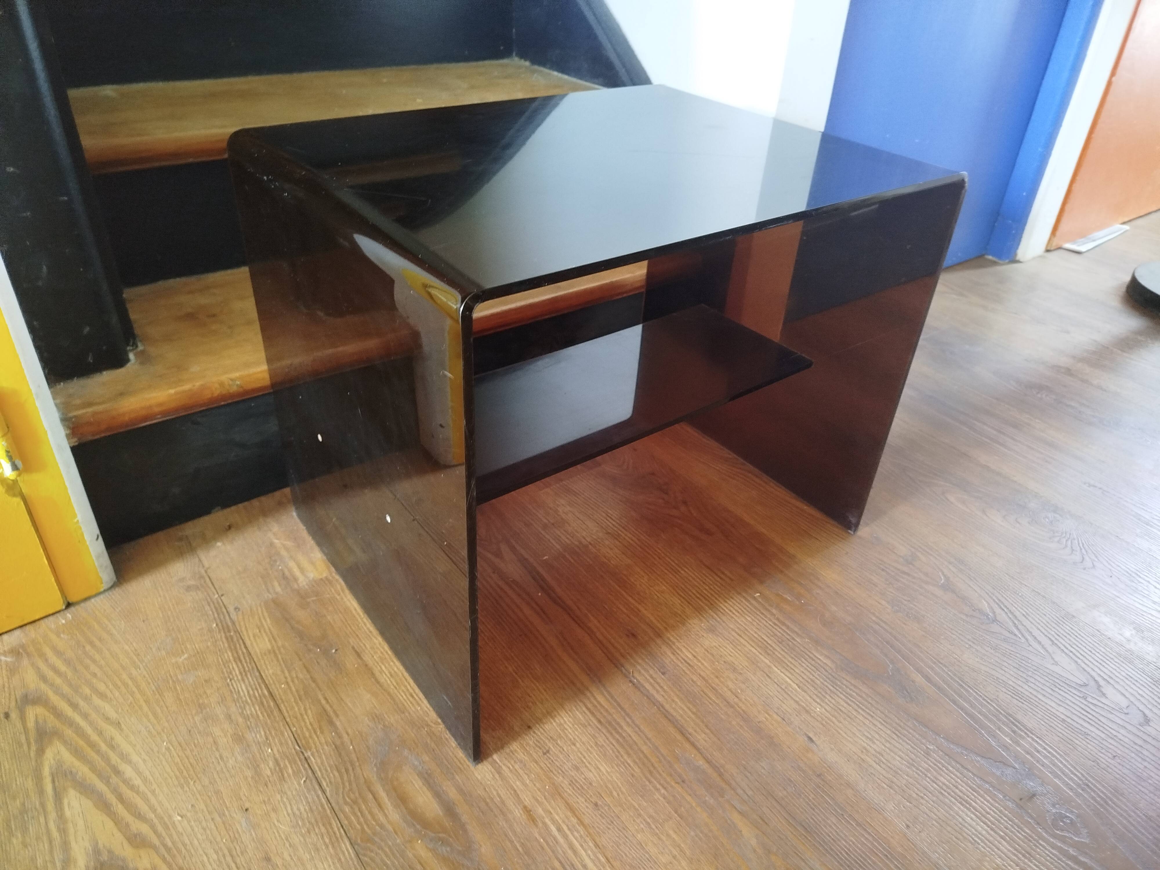 Coffee table / accent piece by Michel Dumas in smoked plexiglass – year