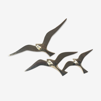 Trio of brass birds