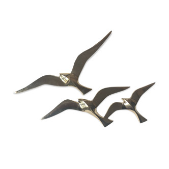 Trio of brass birds