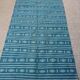 Hand-woven blue and white kilim rug in natural wool