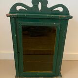 Wall vitrin with pediment