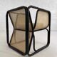 Cubic armchair in black rattan and canework