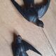 Paire d'hirondelles en bois vintage