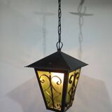 Wrought iron and green glass lantern