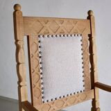 Carved oak armchair by Henning Kjaernulf | Denmark | 1960s