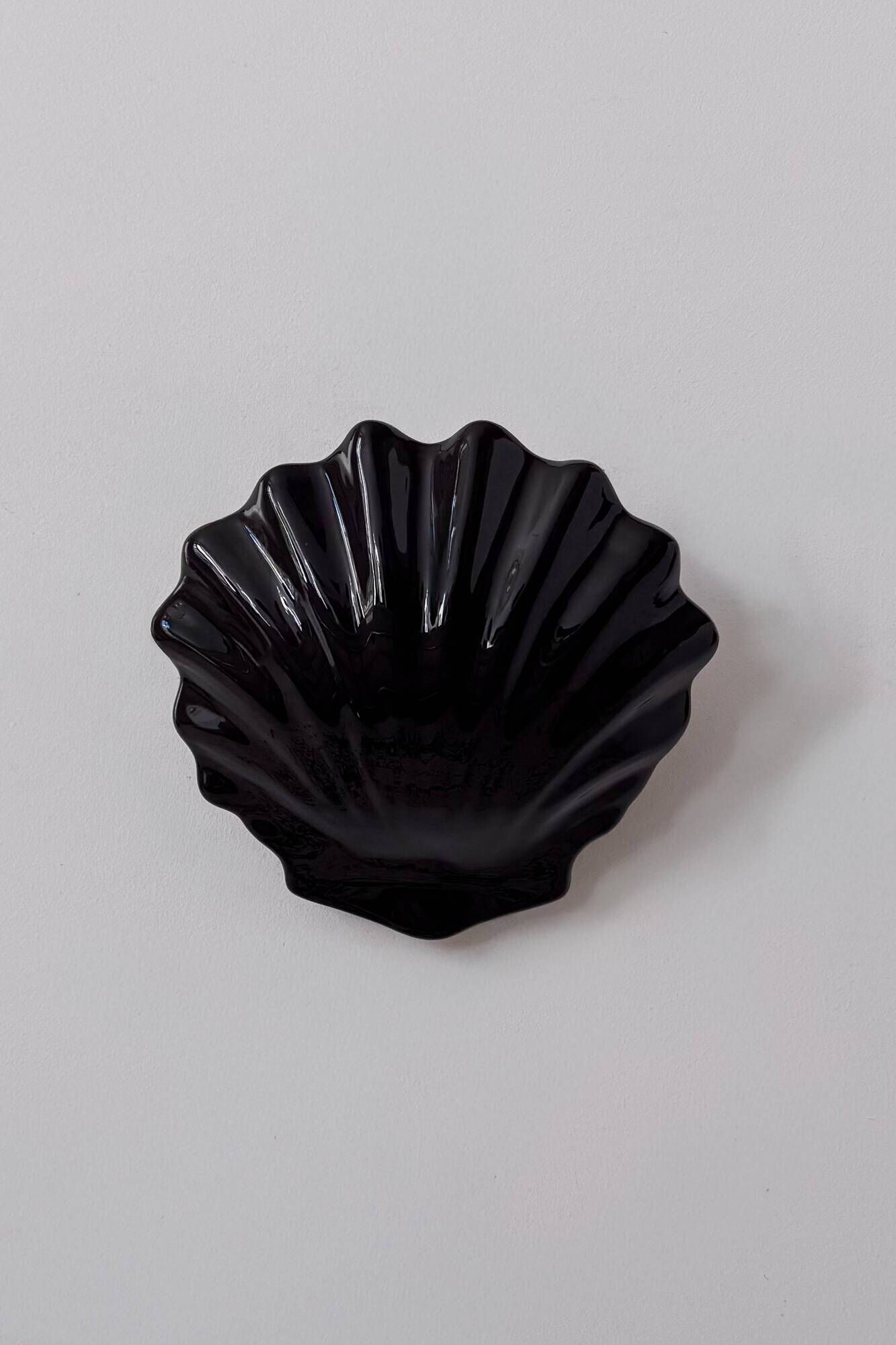 Pair of vintage wall lights in black porcelain, France 1970.