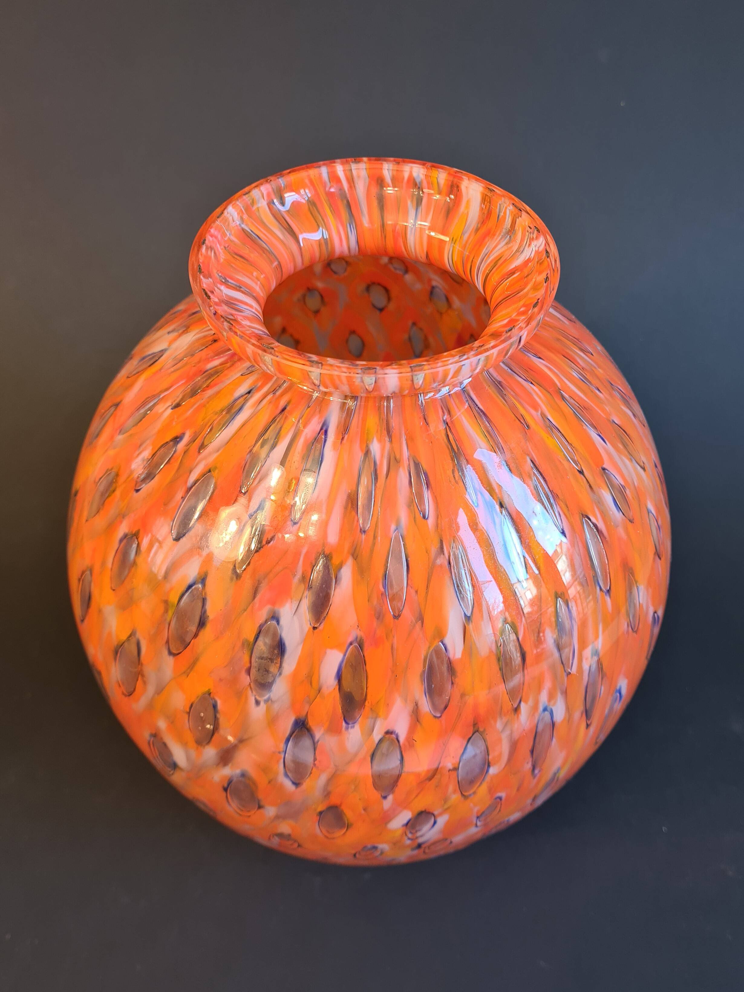 Shimmering orange blown glass vase