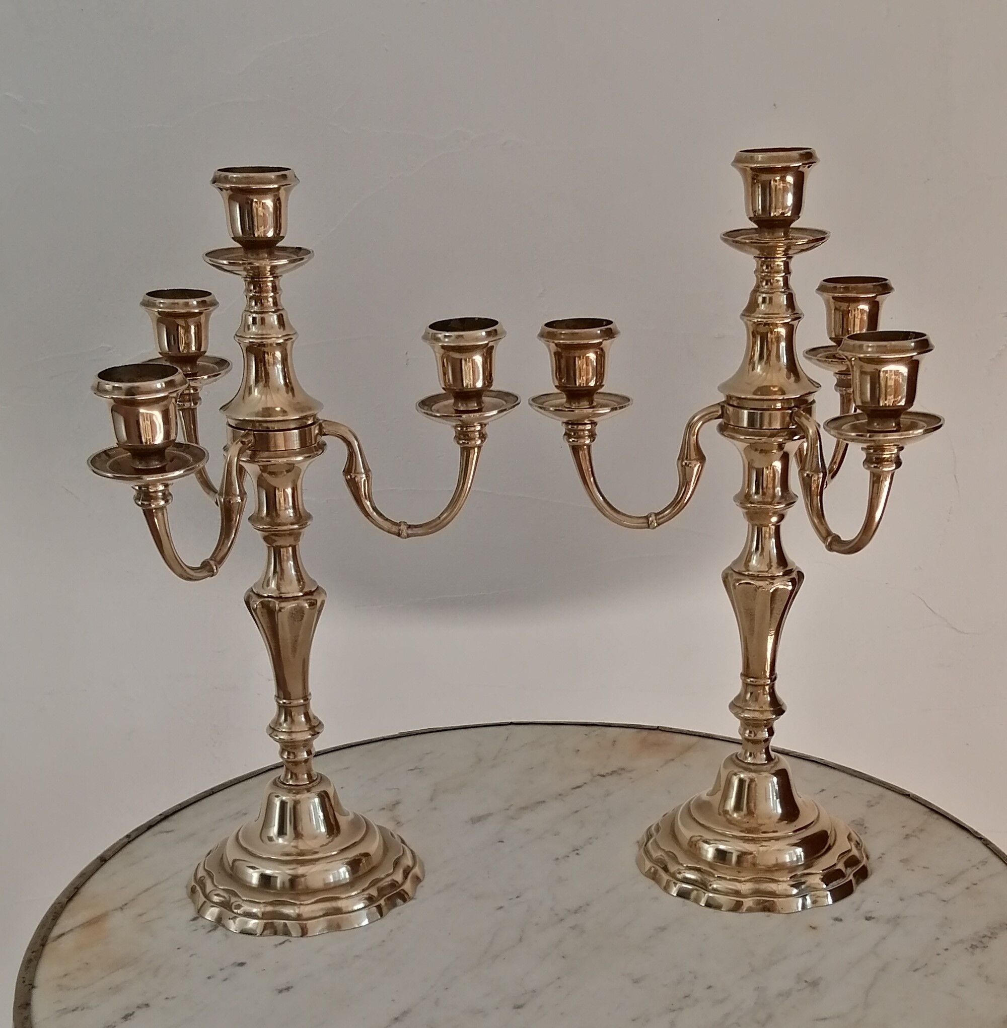 Pair of candelabras, brass candle holders