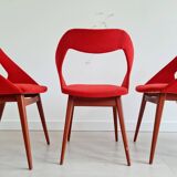 4 Louis Paolozzi red chairs