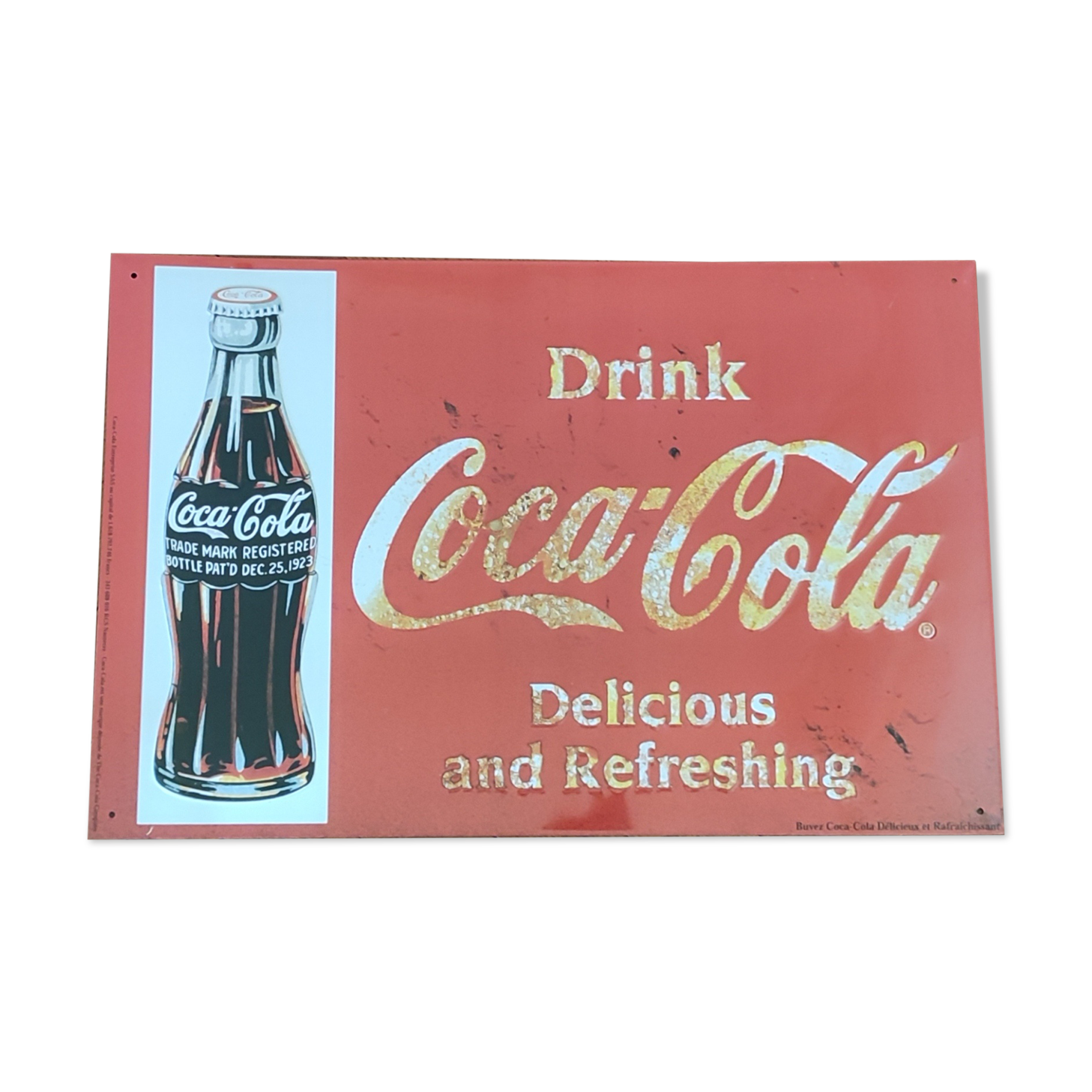 Vintage Coca Cola advertising plaque