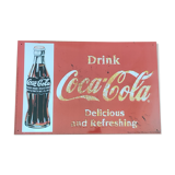 Vintage Coca Cola advertising plaque
