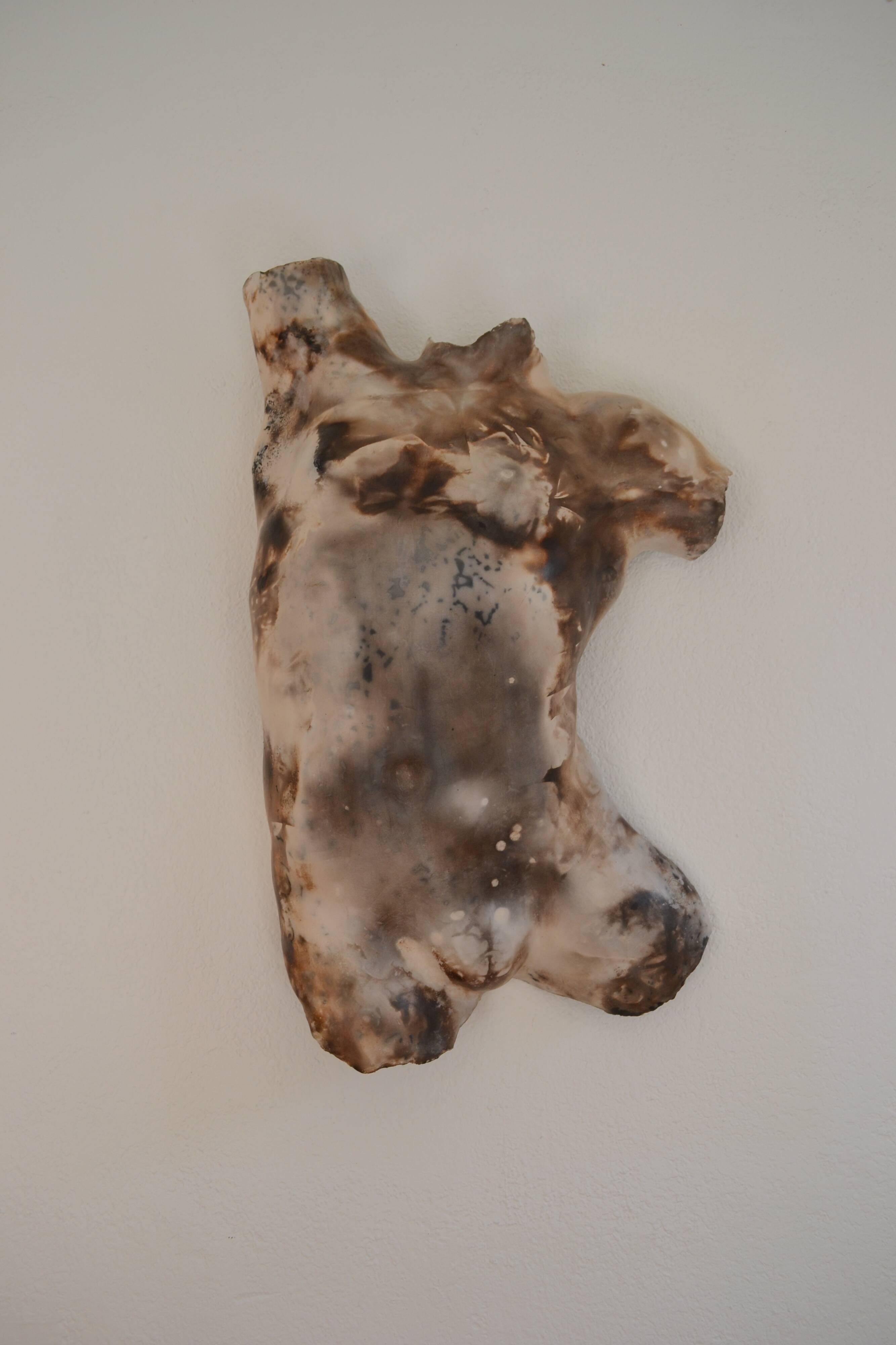 Male torso sculpture by patinated casting, signed to be identified.