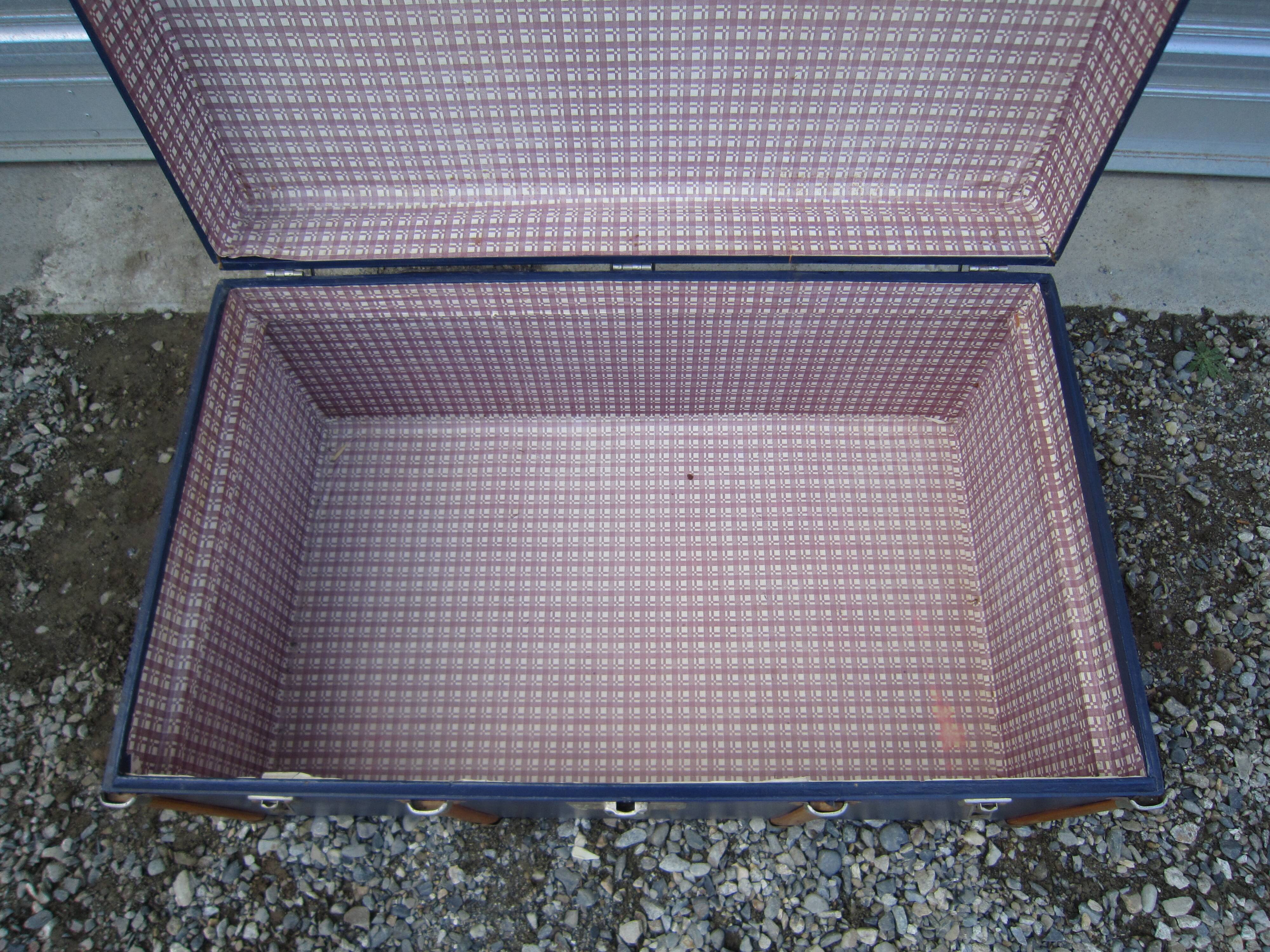 Old blue travel trunk handle leather