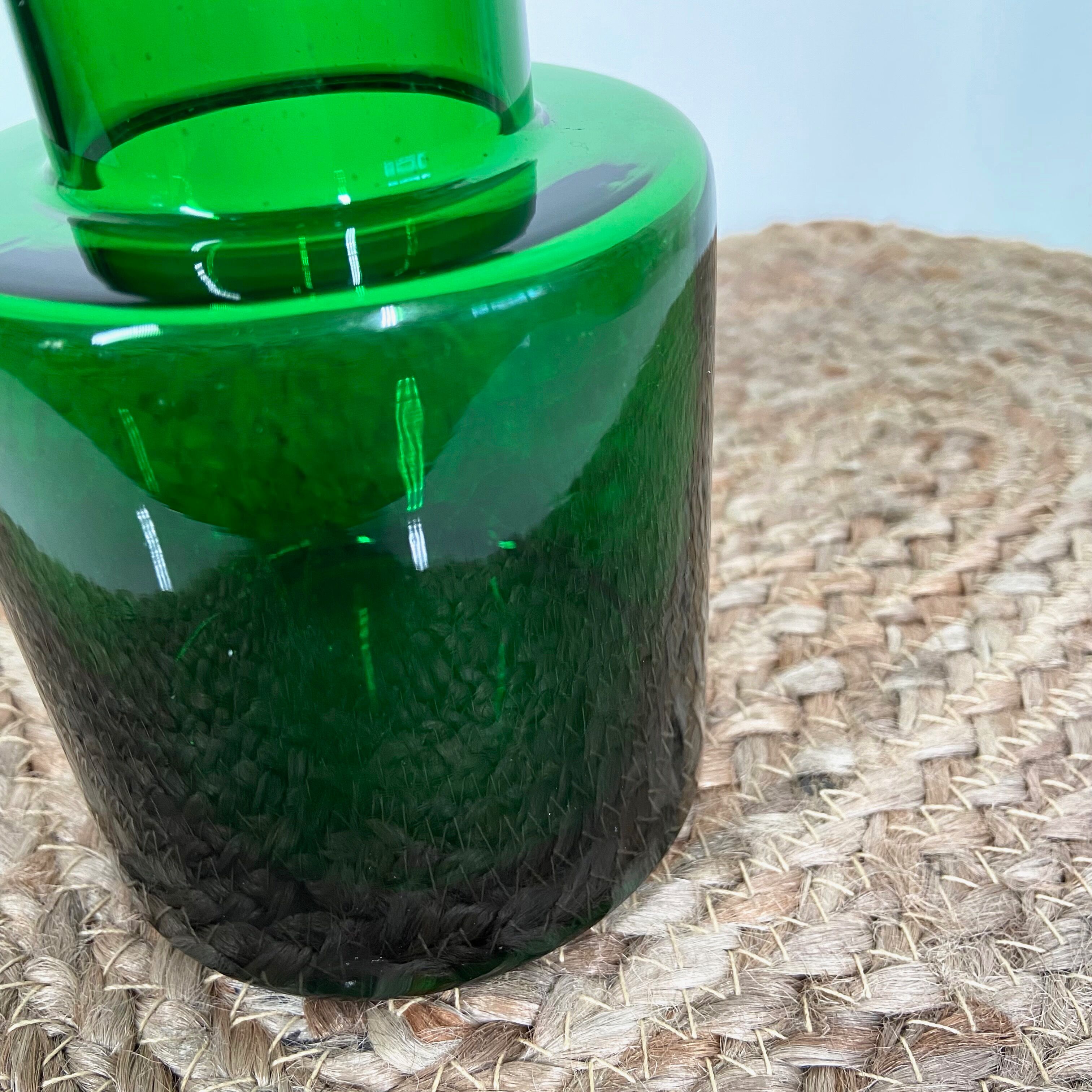 Green colored glass vase