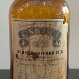 Lot of old glass perfumer bottles with original labels