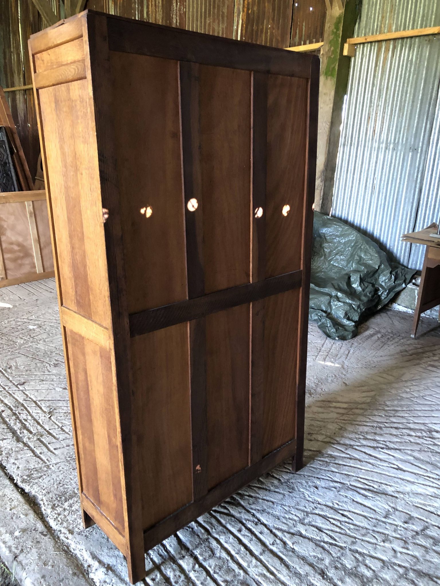 Vintage oak bookcase from the reconstruction period with 2 doors with small panes.