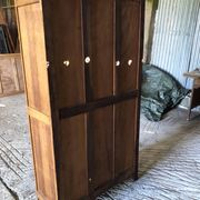 Vintage oak bookcase from the reconstruction period with 2 doors with small panes.
