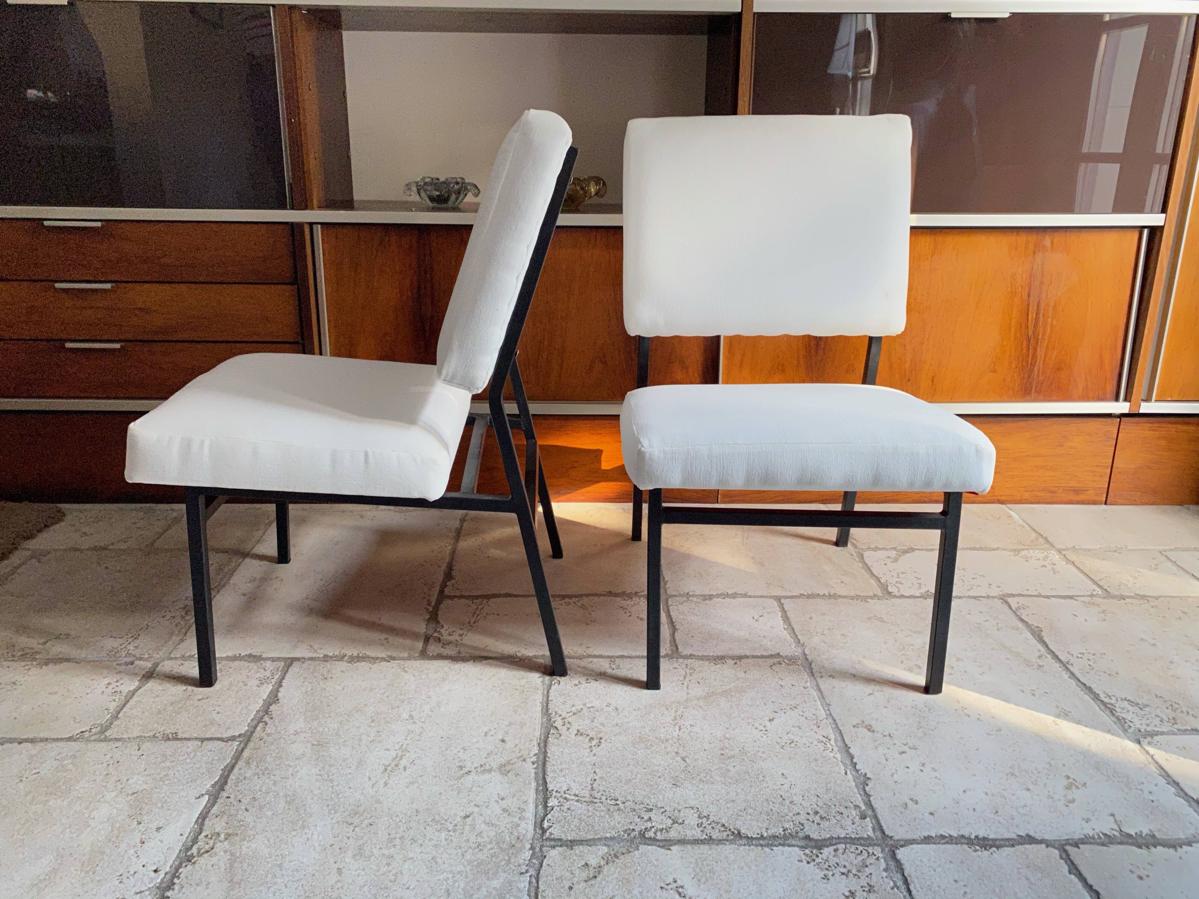 Pair of Paul Geoffroy designer armchairs published by Airborne
