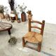 Brutalist chair in wood and straw
