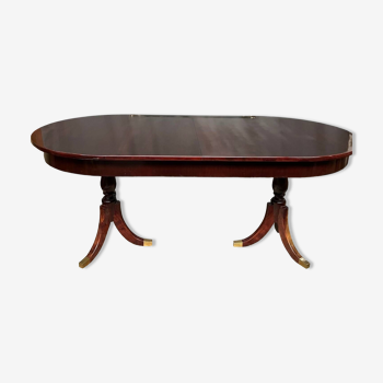 Empire style dining table with two sliding elements.