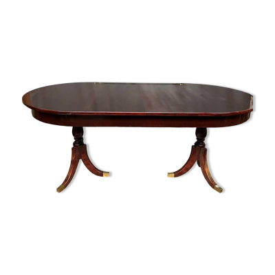 Table à manger de style Empire avec deux éléments coulissants.