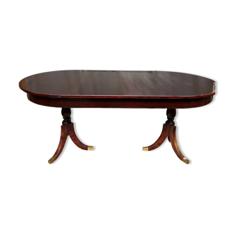 Empire style dining table with two sliding elements.