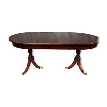 Empire style dining table with two sliding elements.