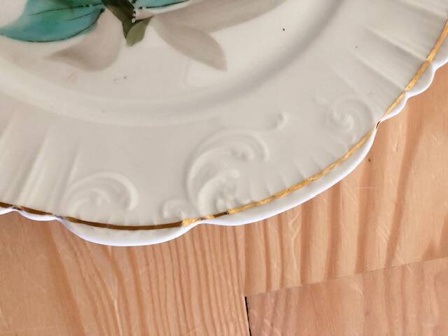 antique earthenware plate with cherries