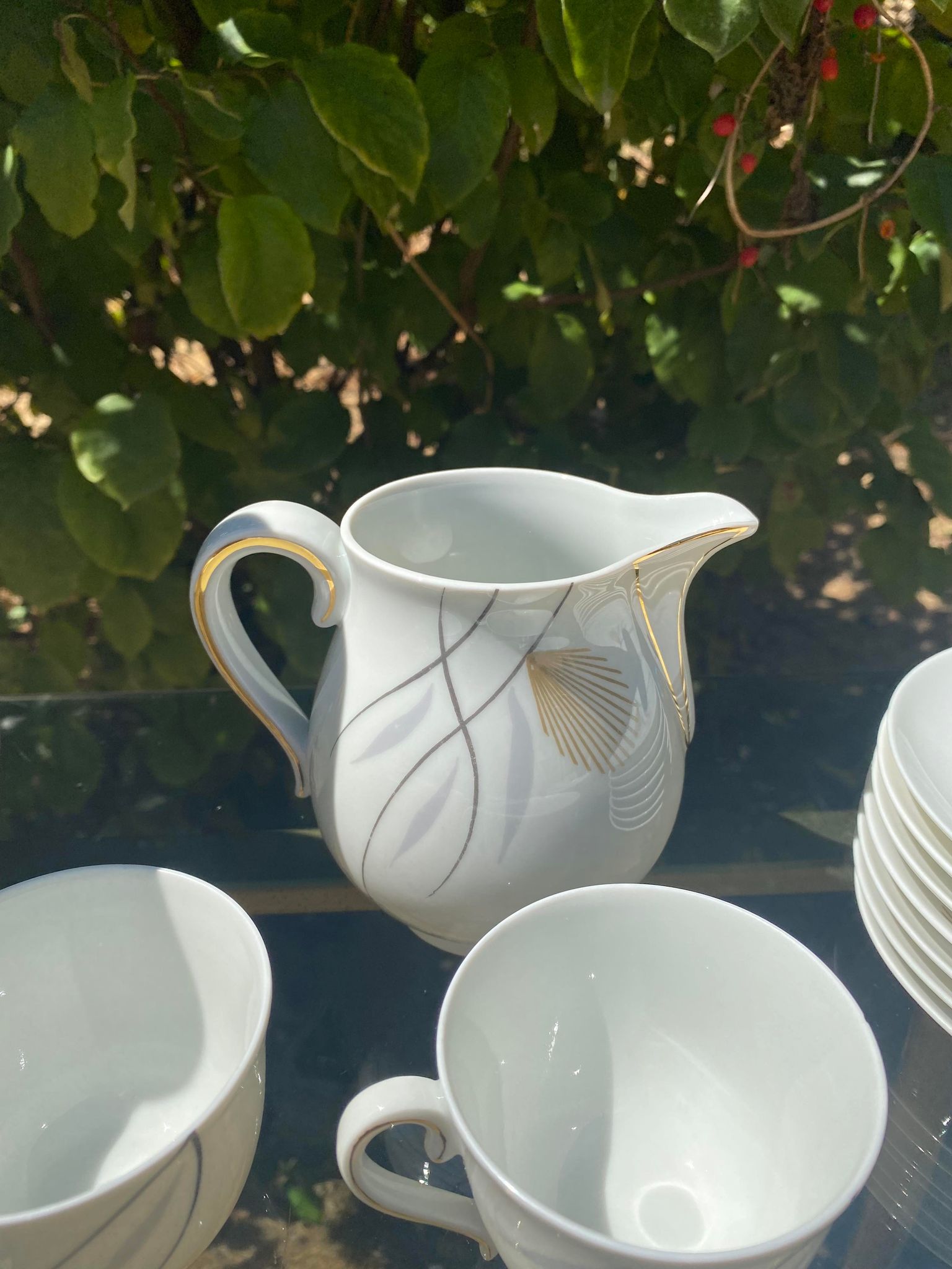 Porcelain coffee service by Charles Ahrenfeldt from Limoges France