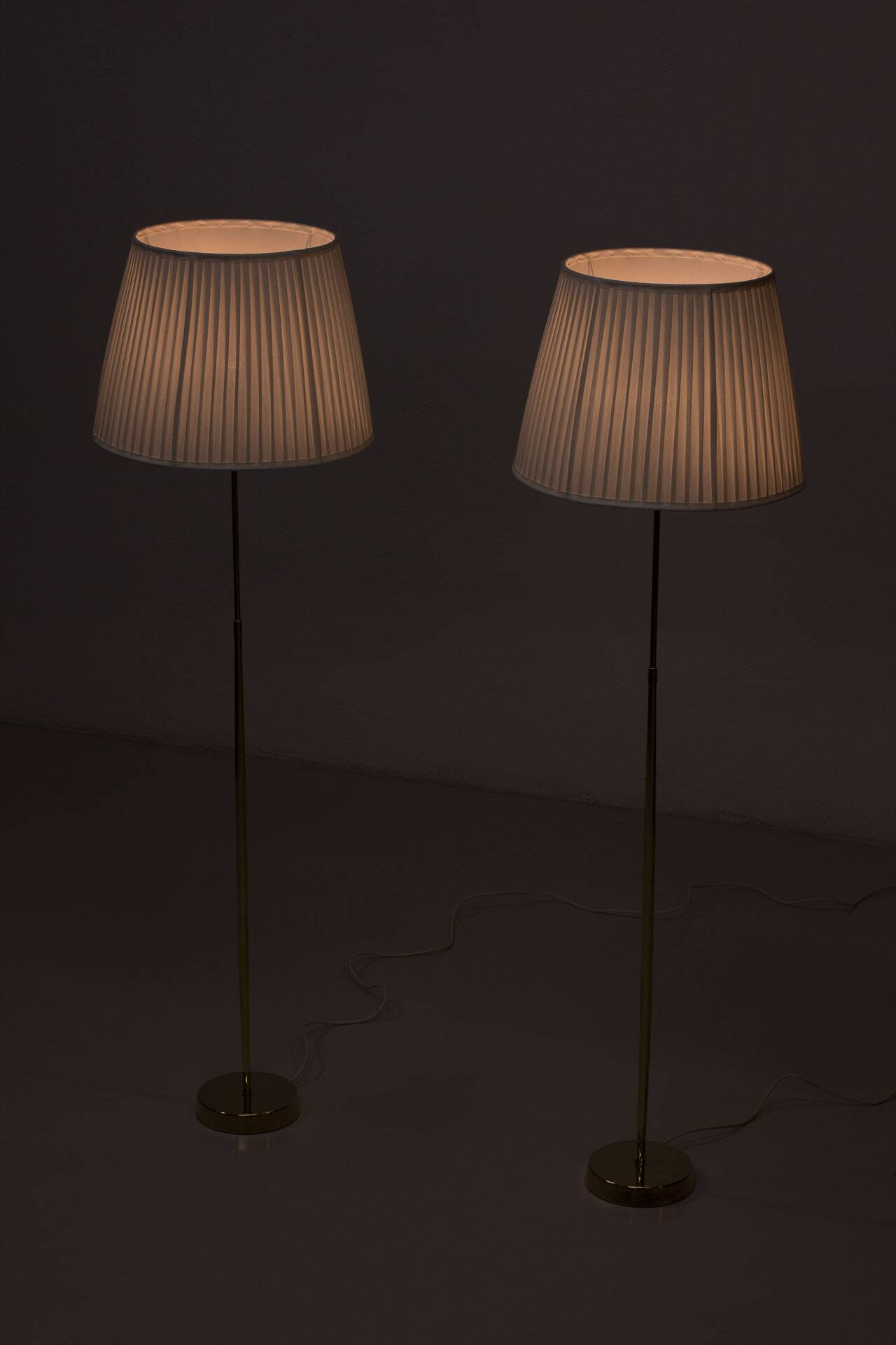 Pair of brass floor lamps by ASEA Belysning, Sweden, 1950s