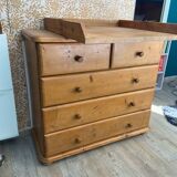 Wooden chest of drawers with changing table