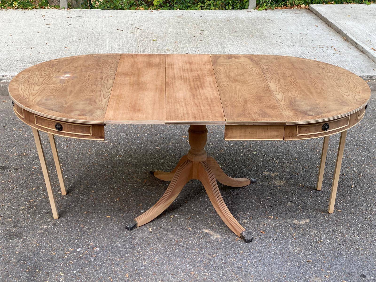 Round extendable dining table Regency central leg stripped mahogany 1960